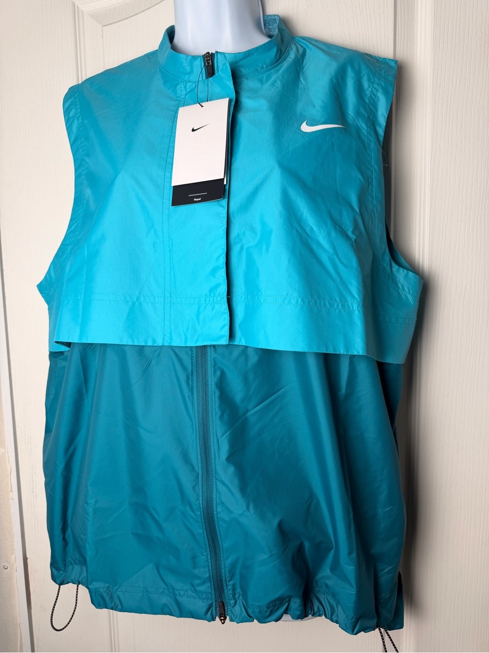 Nike Turquoise Sleeveless Wind Vest with White Swoosh